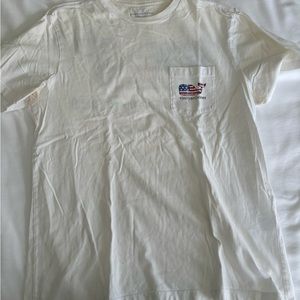 White vineyard vines shirt.